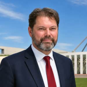 Dr Andrew Lancaster standing outside Parliament House in 2021