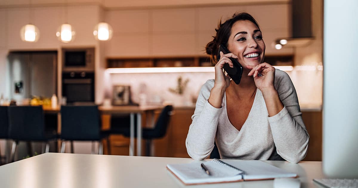 Woman on phone and online