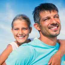 Father and daughter at the beach