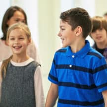 Smiling children walking