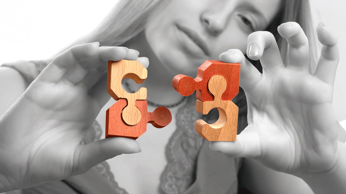 Woman solving a puzzle